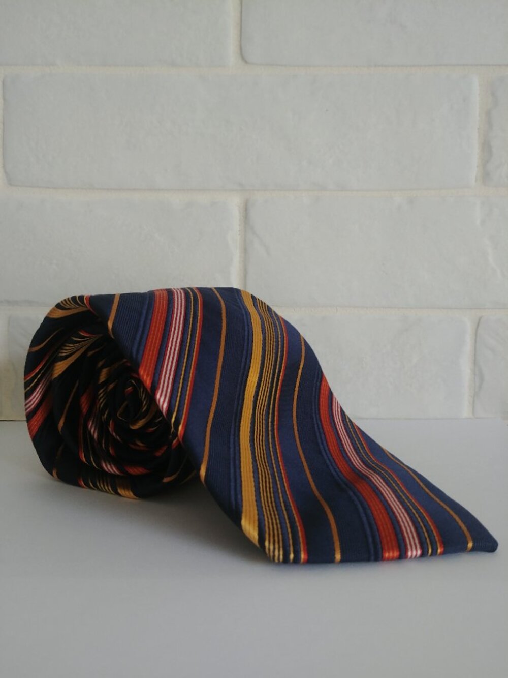Montebello Italia handmade 100% silk navy blue orange yellow striped tie
